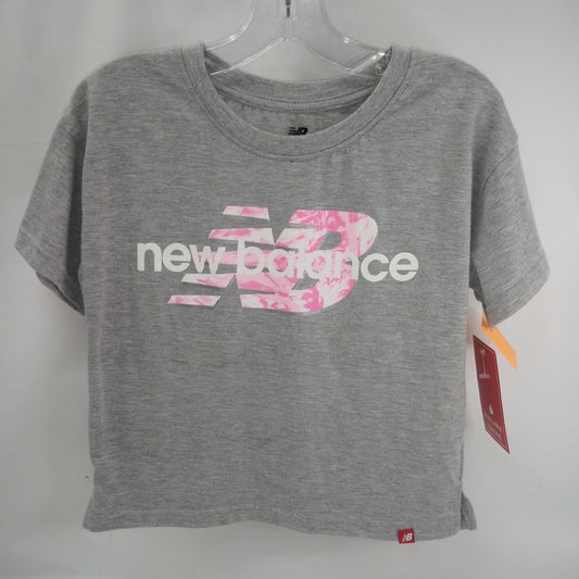 Short Sleeve Shirt by New Balance    Size 7-8